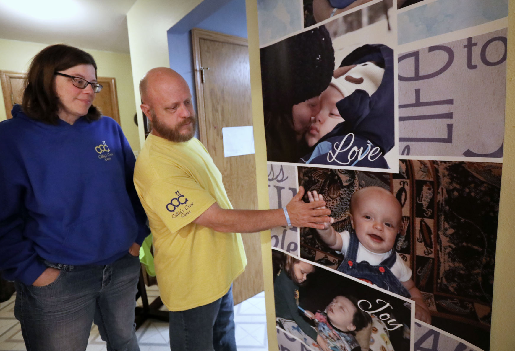 Cushmans with Collin photos on wall (copy)